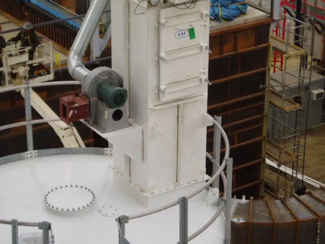IAC Bin Vent dust collector on top of a bulk storage silo.