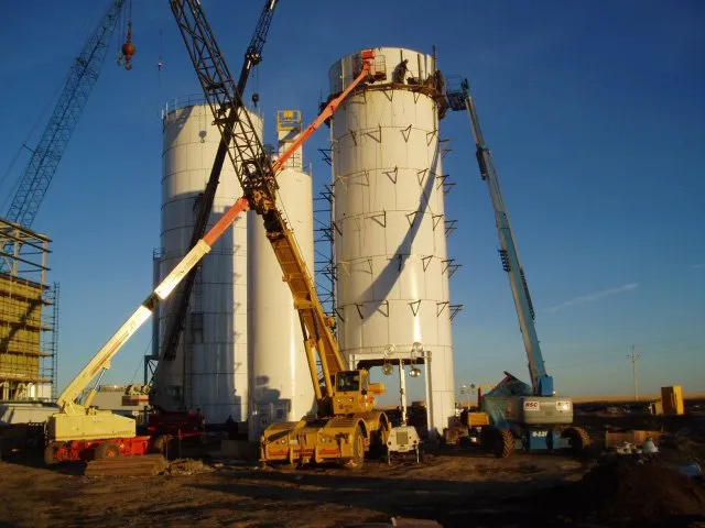 Installation of bolted silos for dry bulk storage.